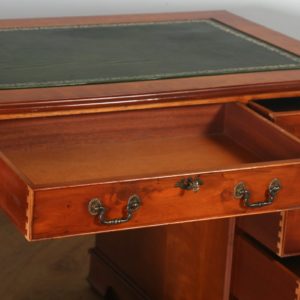 Vintage English Georgian Style Yew Wood & Green Leather 4ft 6” Serpentine Pedestal Desk (Circa Late 20th Century) - yolagray.com
