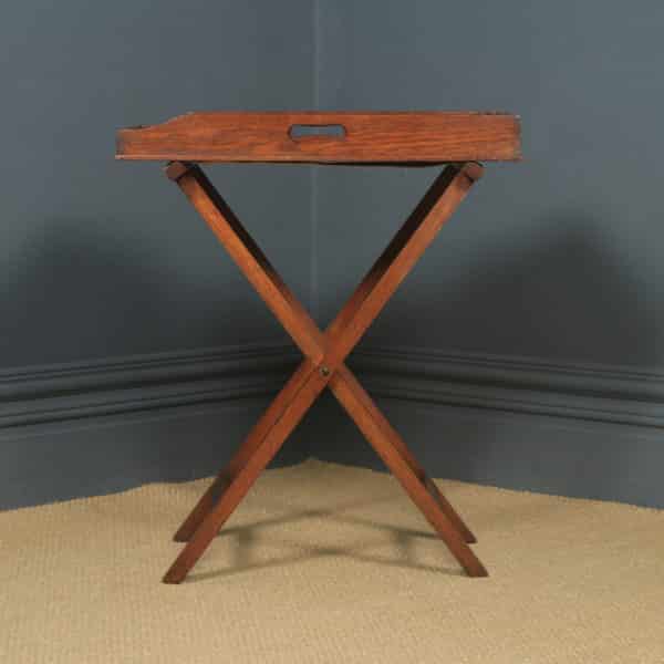 This is a fine quality antique late Victorian butlers’ tray on stand, constructed of solid oak, with a lovely mellow colour, circa 1870, in excellent original condition.