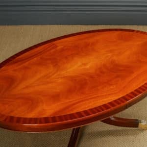 English Georgian Regency Style Flame Mahogany Oval Centre / Coffee Table by Charles Barr (Circa 1980)