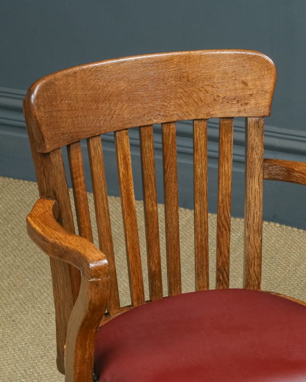 Antique English Edwardian Oak & Red Leather Revolving Office Desk Arm Chair by William Birchcraft (Circa 1910)